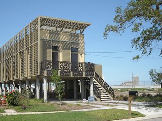 As one of 150 prefab houses in New Orleans designed by architecture firm KieranTimberlake, the home is storm-resistant, affordable, and sustainable. Plus, it seeks to represent the traditional architecture of the area in a modern way.