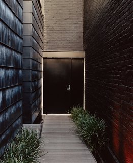 The door to the street boasts a graffiti-resistant paint, rendering even the most temperamental tags temporary.