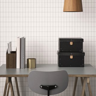 Apply the grid look from floor to ceiling with Ferm Living's WallSmart wallpaper, a new generation of non-woven wallpaper that is supposed to be easier and faster to hang.