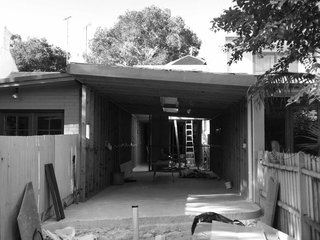 "You can never entirely rely on a set of drawings with the type of projects I work on, as a mountain of unexpected issues arise," Abicic explains. In this case, demolition unearthed remnants of previous structures that required careful removal. The architect also learned he needed to replace the home’s decrepit sewage pipes and upgrade fireproofing to the neighboring building.