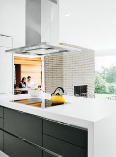 The cooktop and oven are Miele, the counter-top is Caesarstone, and the refrigerator is Liebherr.