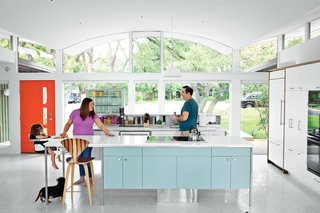 Though the kitchen fits in with its period surroundings, a few tweaks keep it current. "It’s functional in a way that doesn’t feel like the kitchen is in the living room," says architect Rick Black. He explains, "One of the goals was to make the islands more like furniture than like heavy objects that go all the way to the floor."