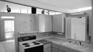 The architects ripped out the existing kitchen, bounded by walls that distracted from the openness of the original house.