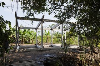 With an average income of $130 a month, residents of the Mekong Delta often create similarly sized thatched housing, but the standard timber frames warp due to flooding and weak soil. The concrete frame costs more upfront, but last much longer.