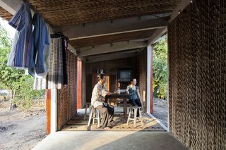 The modest, 322-square-foot interior opens up into the environment.