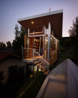At only 172 square feet, this tiny tree house in the hills of Brentwood, California was designed by Rockefeller Partners Architects, Inc. and serves as a refuge, gallery, and guest cottage.