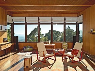 A Modern Prefab Addition to a Mid-Century California Classic - Photo 8 of 9 - Elsewhere in the room, which Esherick sited to maximize views, are Jean Prouvé Cité chairs.