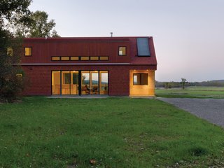 "Like the old farmhouses and barns of the Champlain Valley, the Foote Farm House has a clearly ordered wood frame on a sturdy foundation, an exterior skin made of local materials, an economy of form with tried-and-true proportions, a central fireplace, and a common-sense relationship to the sun and the weather." - Architect John McLeod