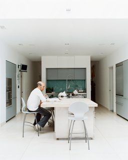 To avoid formality, Phillips created a different environment for each room. The kitchen, for example, is understated by virtue of its simple cabinetry by Boffi, and its white walls that flow with the rest of the house. "What we love about living here," says Judith, "is that it works well with our young family. There is plenty of daylight, all the latest technology, and <br><br>we don’t have to worry about sticky fingers destroying anything."