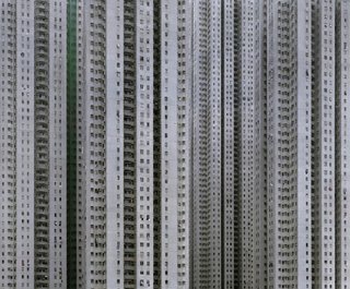 Cropping the sky and horizons out of the images gives the buildings the illusion of what Wolf calls "unlimited size"—the possibility that they could be more than 100 stories tall, and perhaps a mile or more long. Photo by Michael Wolf, courtesy of the Flowers Gallery.