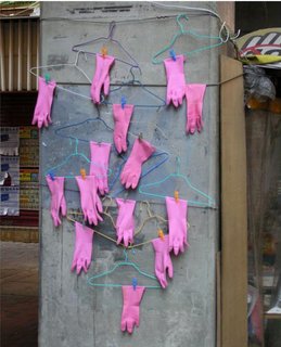 Another detail, this one of rubber gloves hung out to dry. Photo by Michael Wolf, courtesy of the Flowers Gallery.