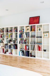 A Versatile House Fulfills All This Musician's Needs - Photo 9 of 11 - A pair of Ikea Expedit shelving units line one wall of the sleeping area.