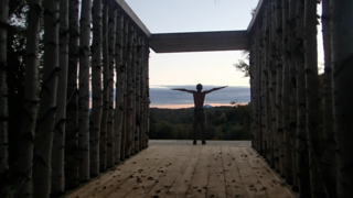 The pavilion is oriented to capture views of the clouds, stars, and foliage. Photo courtesy of Moskow Linn Architects.
