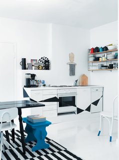 Fine Finnish<br><br>In the kitchen of this tightly-packed apartment in Helsinki, Finland, Susanna and Jussi tore down the ceiling and wall cabinets with the help of Jussi’s father, a skilled craftsman. "Behind the cabinets we found lovely little nooks that work perfectly as shelves for things like salt and pepper mills. When you strip everything to its original state, you are able to see what the house is truly about."<br><br>Photo by: Petra Bindel