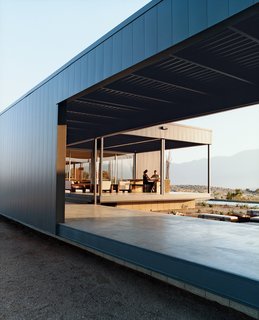Desert Utopia - Photo 1 of 9 - Leo Marmol and Alisa Becket enjoy one of their home’s many outdoor spaces.
