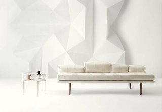 Nendo and BoConcept Collaborate on a New Line of Furniture - Photo 1 of 2 - The fusion collection includes a sofa and a multi-surface end table. Photo courtesy of BoConcept.