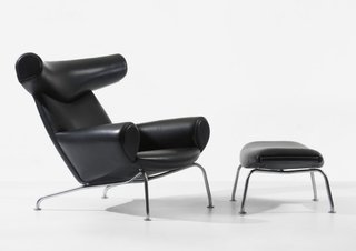 8 Iconic Chairs by Hans Wegner - Photo 7 of 9 - Often referred to as one of the designer’s favorite pieces, the leather Ox chair (1960), perched on chromed steel supports, shows modern design doesn’t always need to be so "dreadfully serious." The inflated shapes of Picasso’s paintings supposedly inspired the shape of this piece, which -- true to form if you’re taking Surrealism as a reference point -- initially were sold with or without horns.