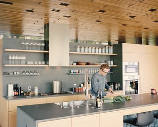 Gray basalt was also used for the kitchen island and backsplash.