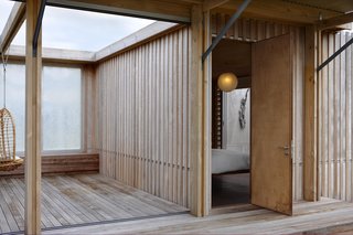 Off-the-Grid Island House in New Zealand Connects with the Outdoors - Photo 3 of 7 -