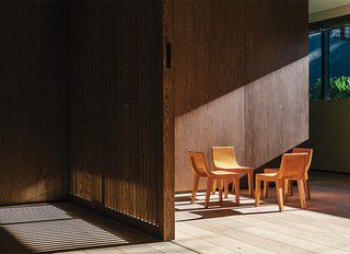 A Lush Retreat With a Sheltered Rooftop Pool in Mexico City - Photo 5 of 14 - Chairs in the second-floor playroom are by Lievore Altherr Molina for Andreu World. Oak sliding doors can close off the playroom to minimize din.