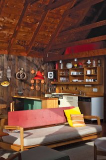 The sofa is a prototype that never went into production—the base slides out and the two cushions become flat for sleeping. Today, one can buy Risom furniture from a variety of sources, including Knoll, Design Within Reach, and Ralph Pucci.