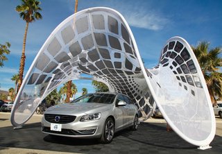 Dwell Media and Volvo Cars Bring The Future of Mobility to Palm Springs Modernism Week 2014 - Photo 1 of 11 - The "Pure Tension Pavilion" made its U.S. debut this weekend as part of Dwell and Volvo’s activation at the Modern Living Expo and Prefab Showcase. Designed by Alvin Huang, this a free-standing tensioned membrane structure is a rapidly deployable and portable solar charging station designed to power up the Volvo V60 Plug-in Hybrid, the world’s first Diesel Plug-in Hybrid.