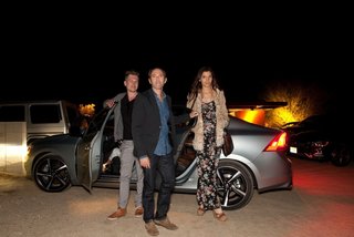 Dwell Media and Volvo Cars Bring The Future of Mobility to Palm Springs Modernism Week 2014 - Photo 8 of 11 - NORM designer and architect Kasper Rønn, shft.com founder Peter Glatzer, and Maria Margarita Chon exit a Volvo S60 as they arrive at the Marmol Radziner Desert Prefab for dinner.