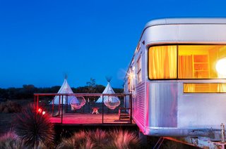 Night settles in around the wanderers sheltered in El Cosmico's teepees and trailers. As El Cosmico shows, understanding a small space involves understanding the infinitude of the world beyond them.