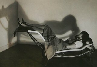 Chaise Lounge (1928)Perriand’s first landmark collaboration with Corbusier and Pierre Jeanneret, this triptych of chromium-plated steel chairs, presented a Modernist view of living. Each was crafted with a specific function. The B301 sling back chair was for conversation, the LC2 Grand Confort was for relaxation, and the B306 chaise lounge was meant for sleeping. Above, Perriand, sporting a Josephine Baker hairstyle, poses with the lounge. She’d later re-interpret this signature work with bamboo. Photo via designmuseum.org.