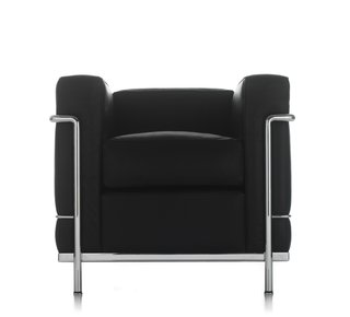 Grand Confort Armchair (1928)Inspired by a Maples club chair that caught Le Corbusier’s eye, this cubical creation is one of Perriand’s most famous designs. Decades later, it’s still iconic, as anyone who’s seen Maxell’s famous ads from the ‘80s can attest. Photo courtesy of Cassina.