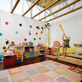 Opened House - Photo 7 of 7 - Ella's bedroom sports walls covered in polka dots that JJ hand-cut from fabric.
