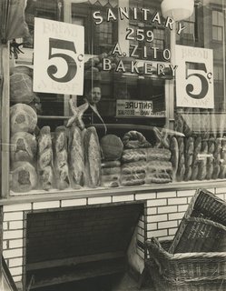 Berenice Abbott. Bread Store, 259 Bleecker Street, Manhattan, February 3, 1937 Gelatin silver print; printed c.1937