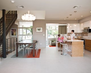 A s1 Zeppelin chandelier by Marcel Wanders for Flos hovers above the living space.