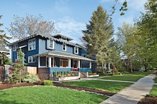 The front of the 1910 house belies the modern extension architects Doug Skidmore and Heidi Beebe created to extend the family’s living space.