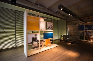 Perriand's photographs are on display next to her Berger and Méribel stools at the Cassina showroom in New York City. Photo by Federica Carlet.