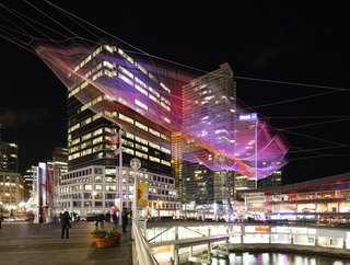 Sculpture Lets the Public Paint the Sky - Photo 3 of 4 - Janet Echelman’s "Skies Painted with Unnumbered Sparks"<br><br>The sculpture combined Wolverine-like strength, sophisticated technology and gorgeous execution, and was a massive technical challenge for Echelman and the team of more than 100 designers and engineers. Aaron Koblin, Creative Director of the Data Arts Team in Google’s Creative Lab, designed the public interface, which literally allows pedestrians to walk by and "paint the sky" with an open mobile browser.<br><br>Credit: Ema Peter
