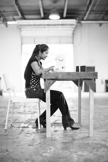 Exhibition Presents Design as a Force for Social Change - Photo 5 of 5 - A participant in Plywood People's Billboar Bags project at work. Photo by Morgan Blake.