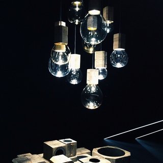 At Lasvit's Salone exhibition: the LED-illuminated Moulds pendant lights by Jan Plecháč and Henry Wielgus capture the moment when molten glass emerges from its mold.