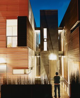 Jorge appreciates his efforts at twilight. The polycarbonate panels that partially clad the exterior of the structure provide a warm glow, adding life to Tijuana’s densely packed rolling hillsides