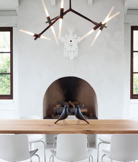 Design Classic: Eames House Bird - Photo 5 of 6 - The dining space in this Atlanta abode features two Eames House Birds and a cuckoo clock from Diamantini & Domeniconi. Photo by Gregory Miller.