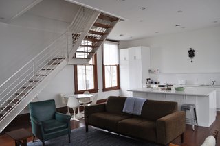 The living room and kitchen occupy a former classroom. It had been a schoolhouse up until DeAno and her husband purchased it in 2006.
