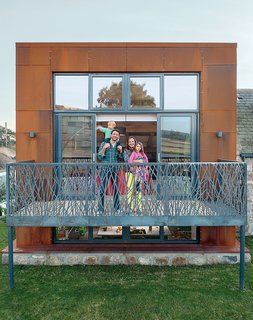 Architect Andrew McAvoy created an earth-sheltered house in Scotland for Gavin and Angelique Robb and children Scarlett and Gus.