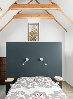 Designer Sue Macintosh chose the Farrow & Ball Off-Black paint for the master bedroom.