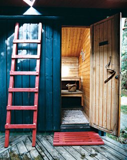 The sauna door handle is a simple piece of driftwood. "One principle rule I followed," says Kiehl, "was: Don’t build on outdoor space if it can work as outdoor living space. Norwegian summers are short. We want to be outdoors as much as possible."