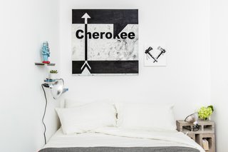 Another view of the master bedroom shows more original artwork by the New Design Project. Photo by Alan Gastelum.