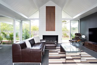 The combination of high ceilings and a cathedral-style design add character to the kitchen area. Photo by Mariko Reed.