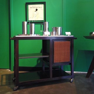 A Dunbar bar cart by Edward Wormley is one of Posch's noteworthy pieces. "Even though there are new items in the store that certainly merit mention, it does seem that the vintage items we get are generally the most exceptional," he says. "The cart has a white laminate top that folds open for extra work surface, the middle shelf is grey laminate and the bottom shelf is black; and it has a storage compartment with caned doors. It's a stellar piece."