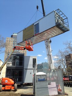 "It was erected in one and a half days; the modulars went up in one day, the stairs went up the next," Garrison says. The construction process can be viewed in a video on Garrison's blog.