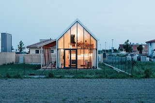 Small Country Home with Dramatic See-Through Wall - Photo 1 of 8 -