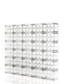 Bottle (1994) for Magis<br><br>This simple plastic-and-aluminum bottle rack, designed with a small footprint and made to be easily stacked, is about as straightforward and crowd-pleasing as a bottle of good cheap merlot. <br><br>Photo by Magis